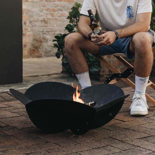Sprung Outdoor Living Fire Rose Fire Pit with fire wood