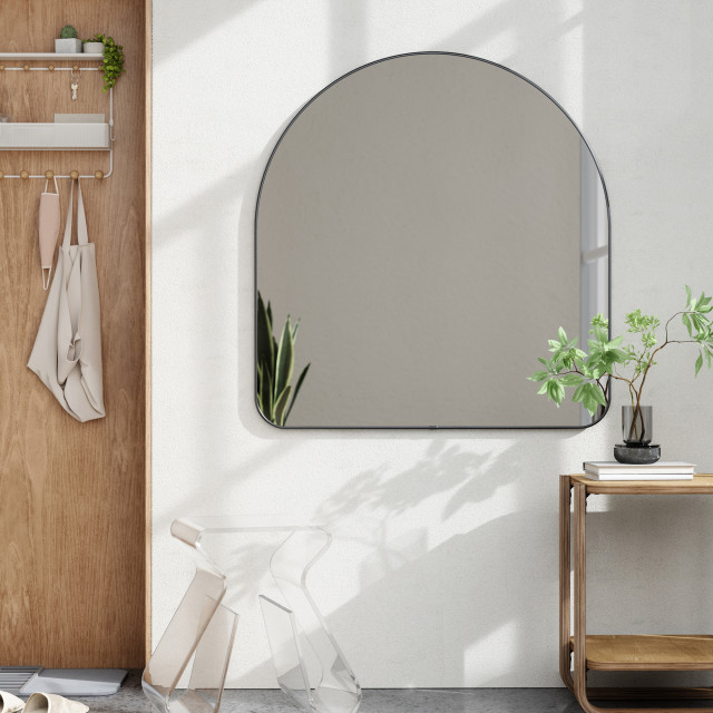 Umbra Hubba Arched Mirror - Metallic Titanium In A Living Room Setting
