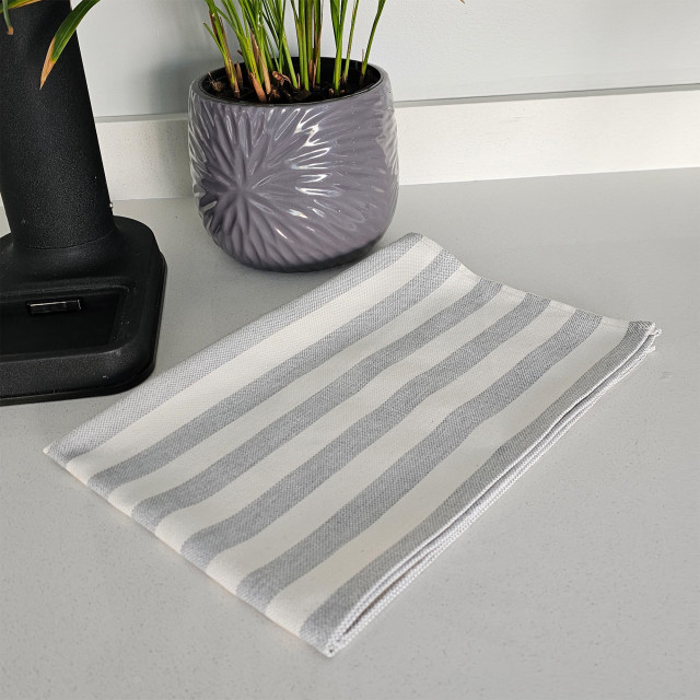 DSA Abigail Mic Tea Towel - Grey on the counter