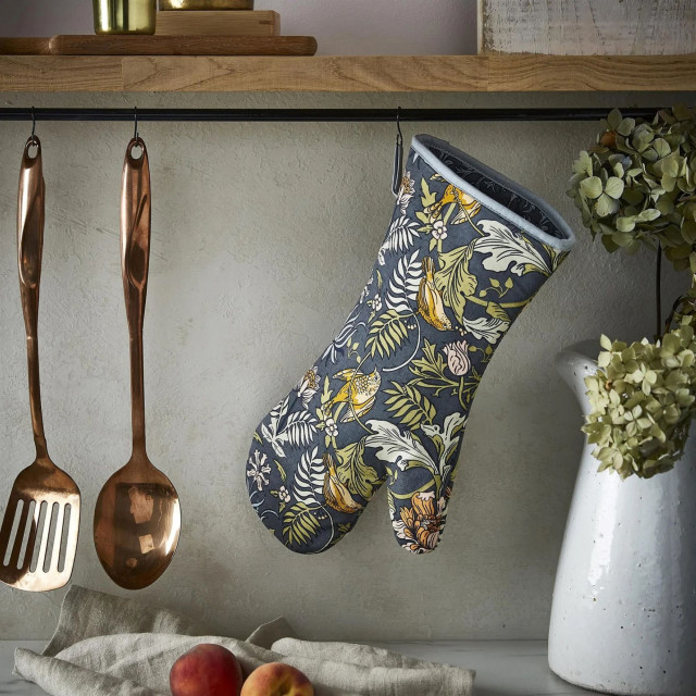 Ulster Weavers Finch and Flower Single Oven Glove hanging on a hook