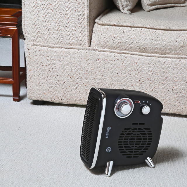 Swan Retro Horizontal & Vertical Fan Heater, 1800W in the living room