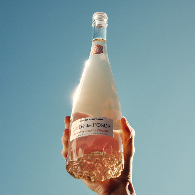 Gerard Bertrand Cote Des Roses Languedoc Rose, 750ml held in the air