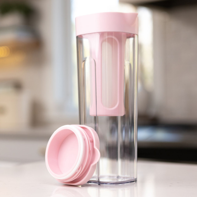 Zuutii Infusion Pitcher, 1.2L - Sakura Pink on the kitchen counter with a lid