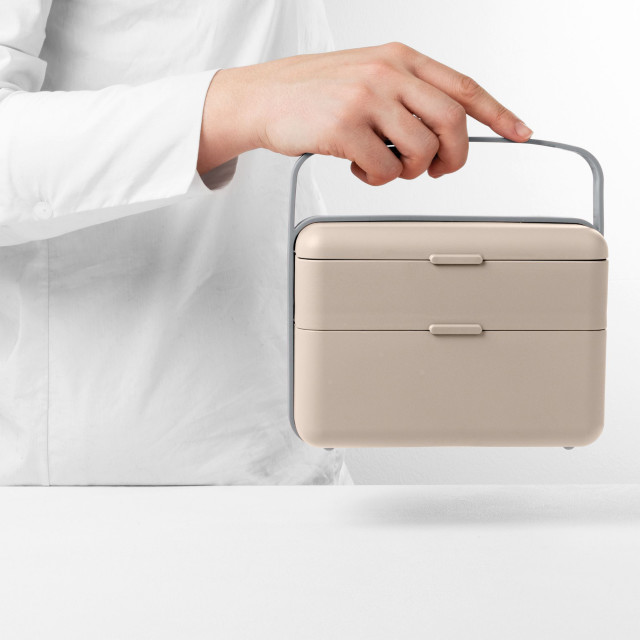 Blim Plus Bauletto Lunchbox, Medium - Moka Grey held on the kitchen counter