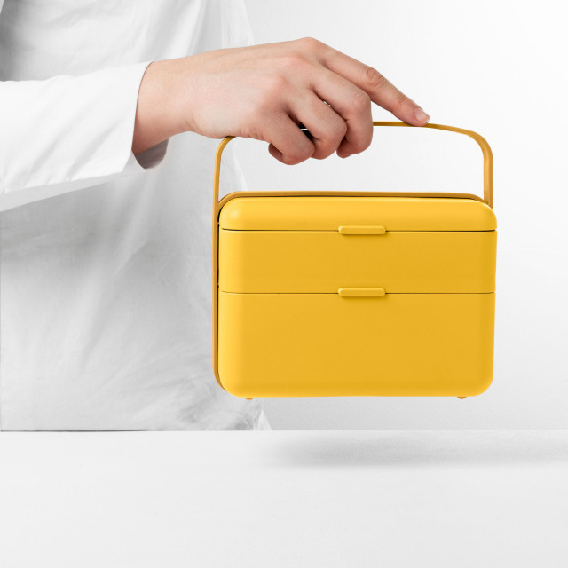 Blim Plus Bauletto Lunchbox, Medium - Desert Medium held on the kitchen counter