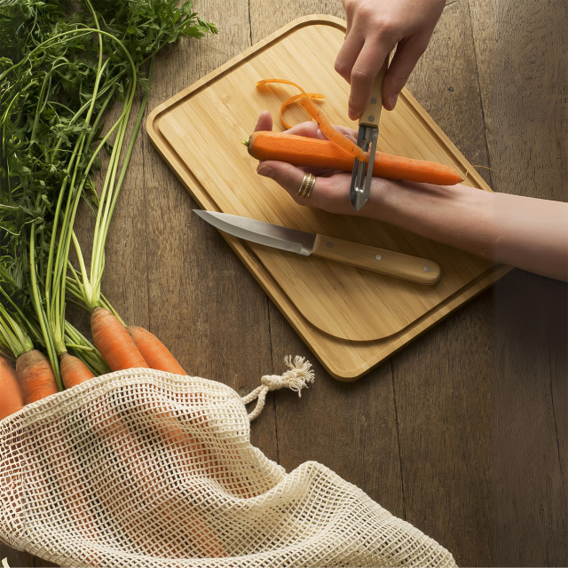 Pebbly Chef Prep Kit, Set of 3 on the table with a peeled carrot