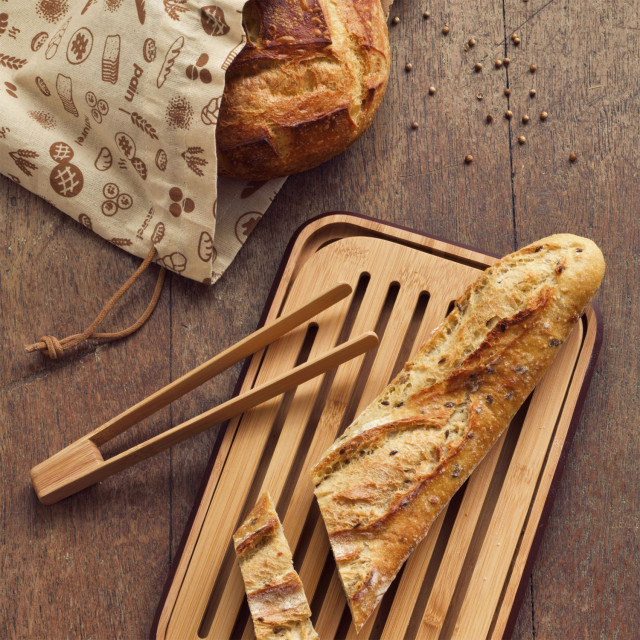 Pebbly Bread Baker Gift Pack, Set of 3 on the able with bread