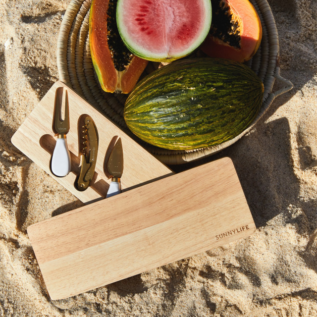Sunnylife Le Weekend Travel Cheese Board Set on beach sand