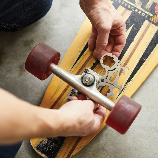 Gentlemens Hardware Mini Bicycle Multi-Tool on a skateboard