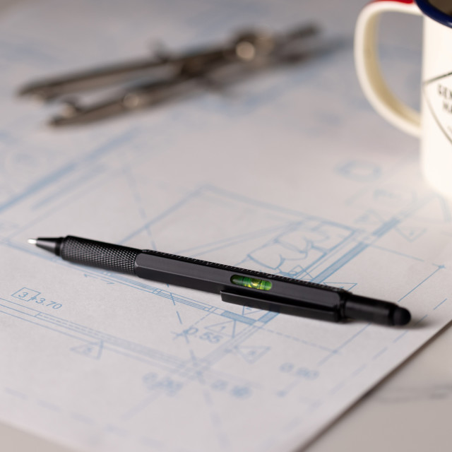 Gentlemens Hardware 6-in-1 Tooling Pen on the table