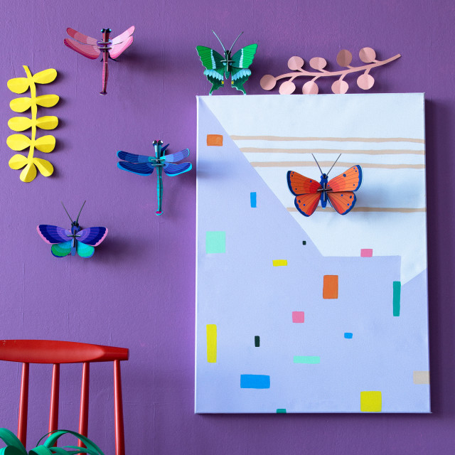 Studio ROOF Blue Dragonfly Wall Decor on the wall with other designs