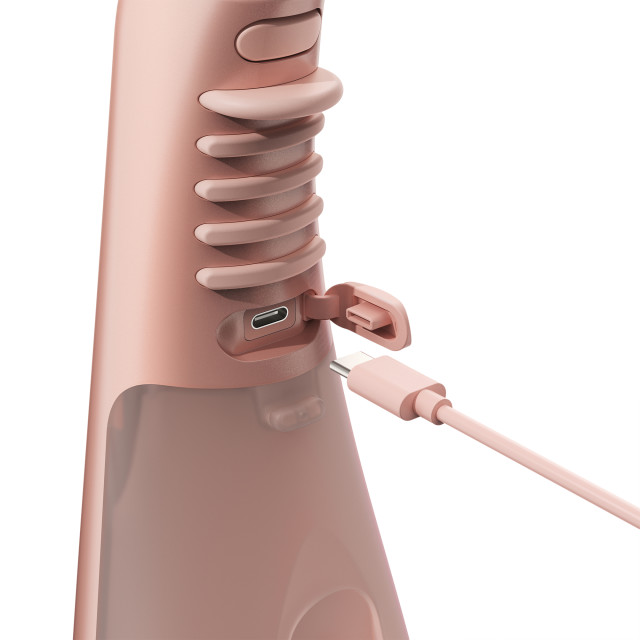 Ordo Hydro Sonic Water Flosser - Rose Gold showing the charging port