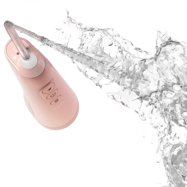 Ordo Hydro Sonic Water Flosser - Rose Gold showing the product in use