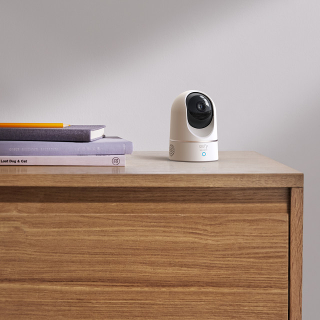 Eufy 2K Pan & Tilt Indoor Security Camera on a side drawer