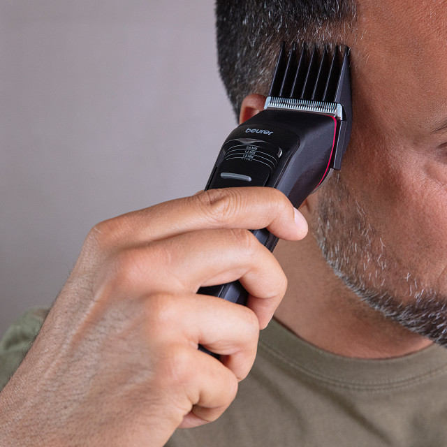 Beurer MN5X Rechargeable Hair Clippers in use on hair line