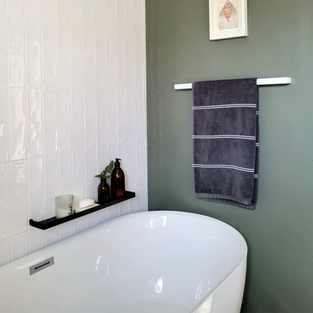 Joon Mila Slim Shower Shelf, 35cm on a wall next to the bathtub