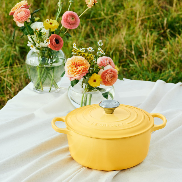 Le Creuset Chamomile Signature 4.2 Litre Round Cocotte, 24cm on the table