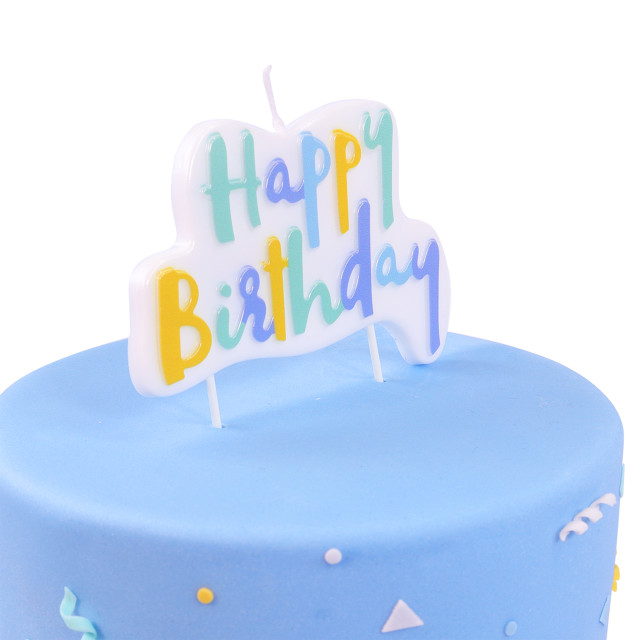 PME Multicolour Happy Birthday Candle - Blue detail on a cake