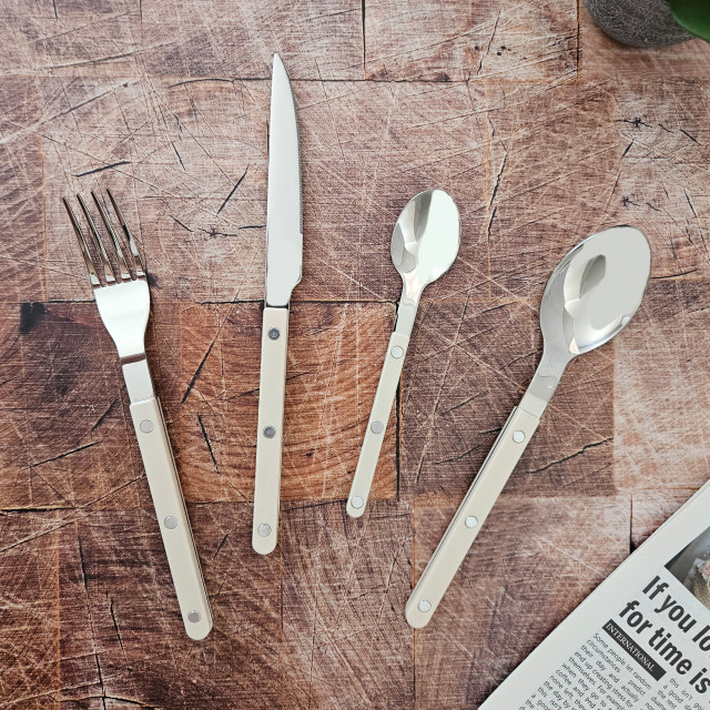 Nicolson Russell Louisiana Cutlery Set, 16-Piece - Ivory on the table