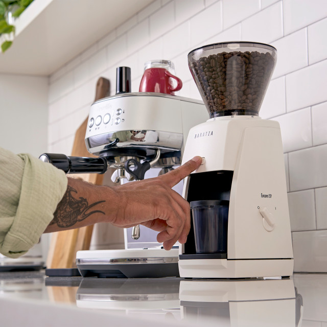Baratza Encore ESP Electric Coffee Grinder - White on the kitchen counter