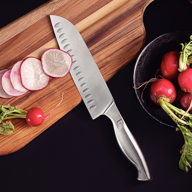 Tramontina Stainless Steel Santoku Knife, 19cm on the table