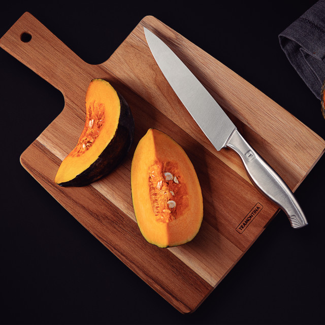 Tramontina Stainless Steel Utility Knife, 15cm on a chopping board