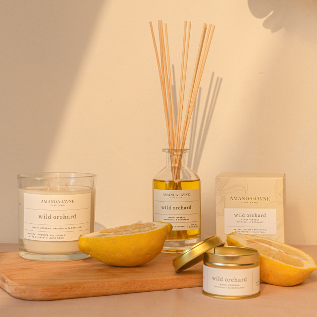 Amanda Jayne Wild Orchard Gold Tin Candle, 100ml with a fragrance spray