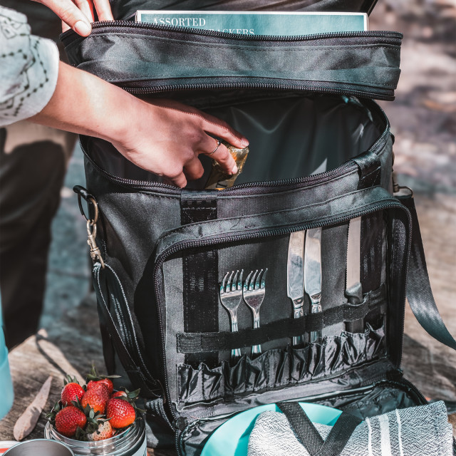 Kulgo Black Picnic Cooler with a bottle of champagne