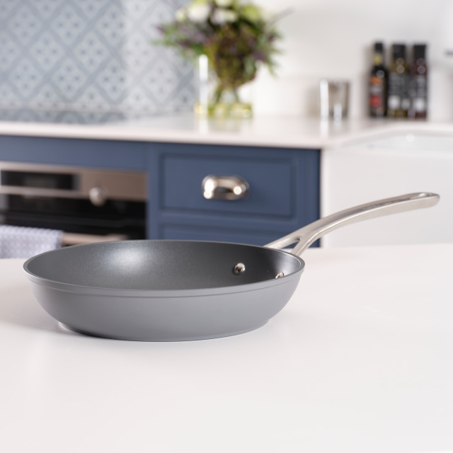 Laura Ashley Non-Stick Frying Pan, 28cm - Dark Slate on the countertop
