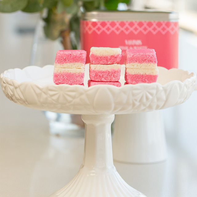 Navinos Coconut Ice Fudge on a cake stand