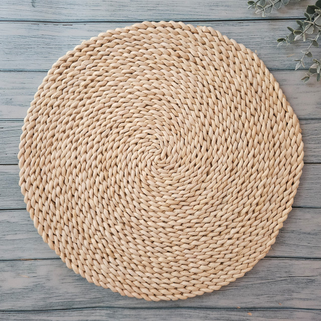 Nicolson Russell Light Rattan Placemats, Set of 2 on the table