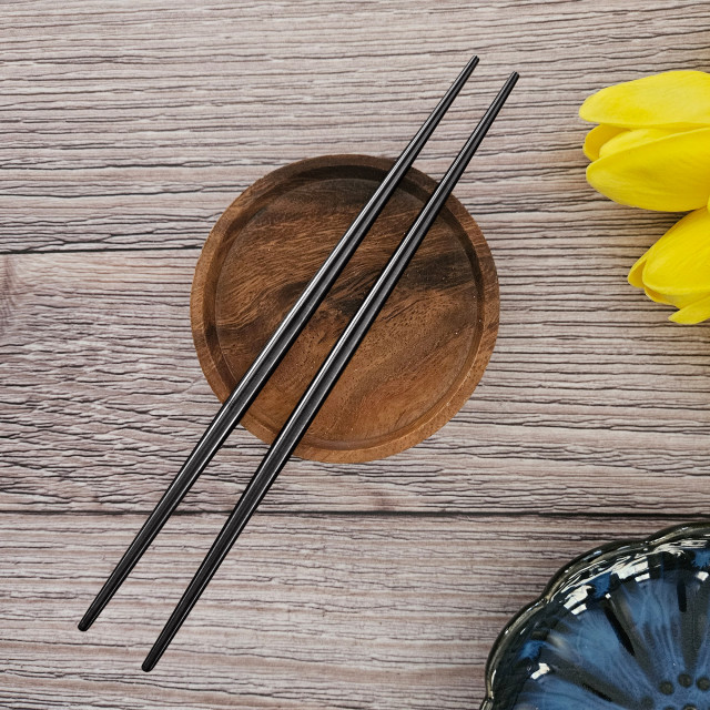 Nicolson Russell Guangzhou Stainless Steel Chopsticks, Set of 2 - Black on the table