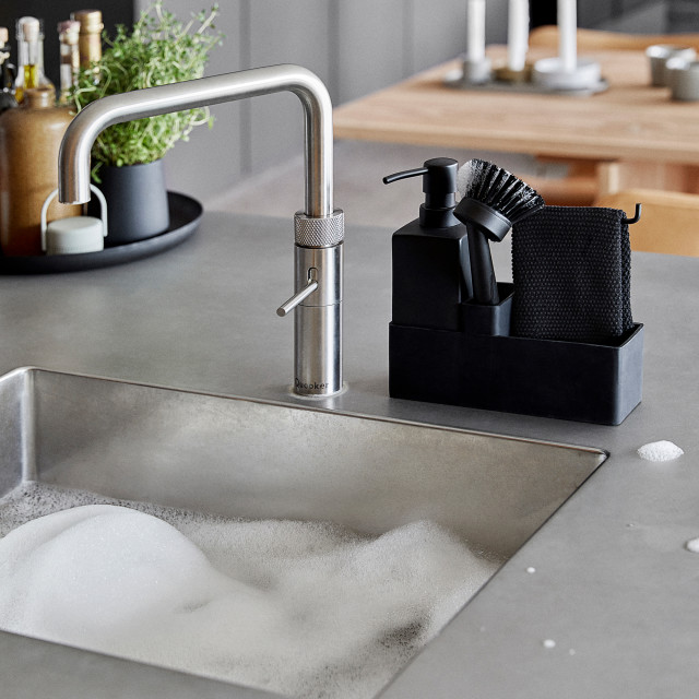 Zone Denmark Dishwashing Set with Cloth - Black next to the sink