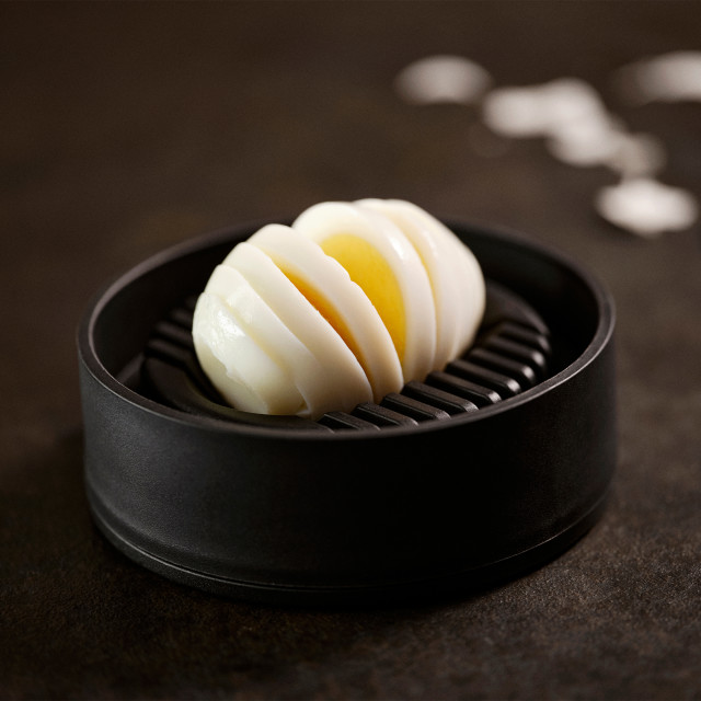 Zone Denmark Singles Egg Slicer - Black with an egg