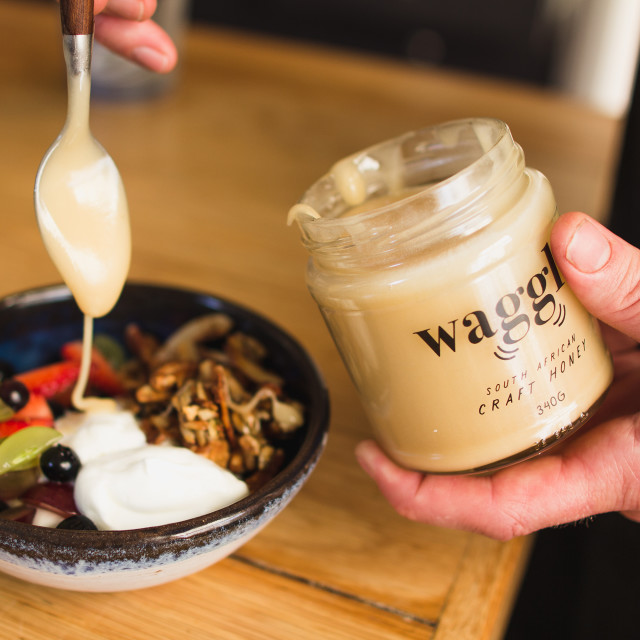 Waggle Creamed Canola Blossom Honey, 340g with breakfast on the table