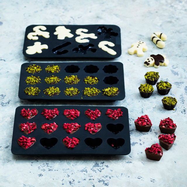 Blomsterbergs Silcone Chocolate Mould, Set of 3 - Grey on the table with chocolate treats