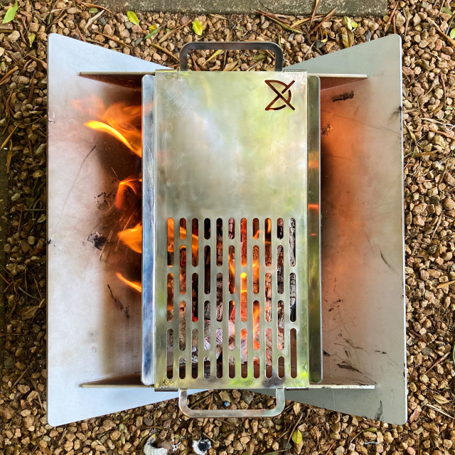 Pretzel Stainless Steel Fire Pit Grill-Skillet on a fire pit