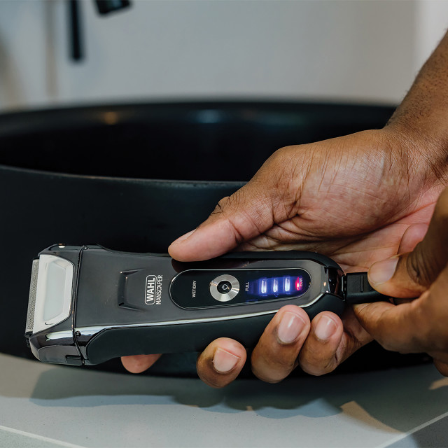 Wahl Manscaper Pro Wet & Dry Rechargeable Shaver being charged