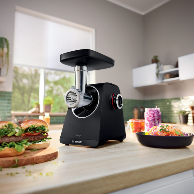 Bosch Series 4 Multi-Power Food Mincer, 1900W on the table