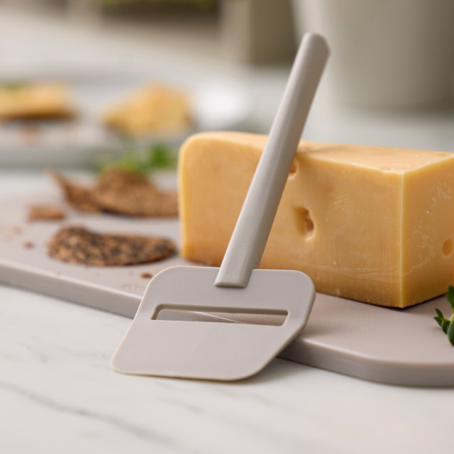 Rosti Emma Cheese Slicer - Humus with a slice of cheese