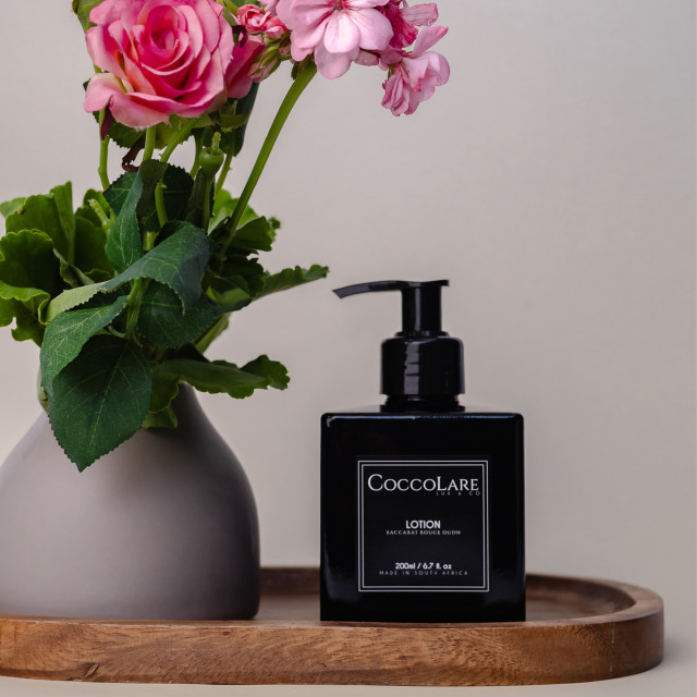 Coccolare Lux & Co Baccarat Rouge Oudh Hand Lotion, 200ml on the table