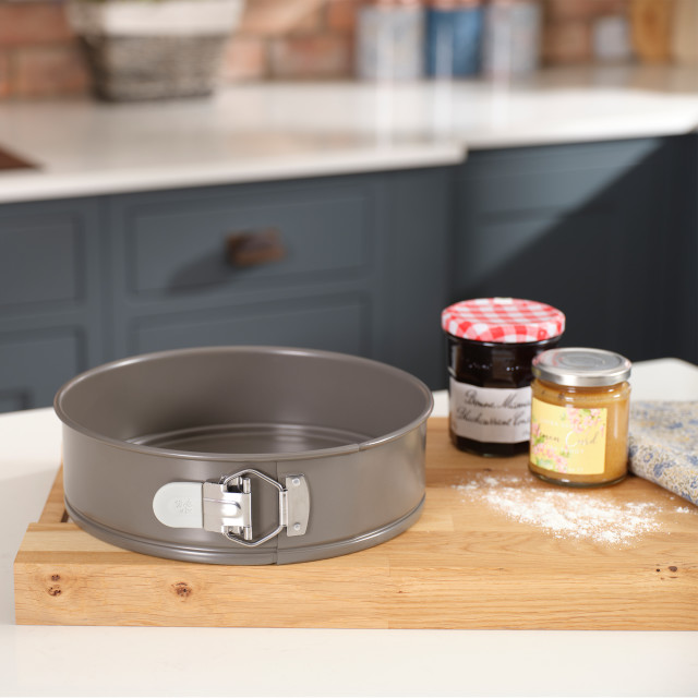 Laura Ashley Non-Stick Carbon Steel Springform Cake Pan, 23.5cm on the kitchen counter