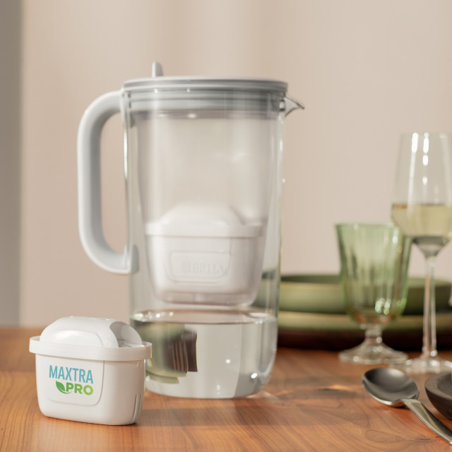 Brita Light Blue Glass Filter Water Jug with Filter, 2.5L on table with filter