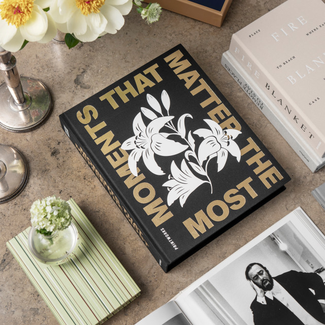 Printworks Moments that Matter the Most Photo Album - Black on the table