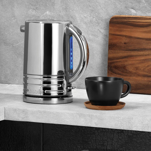 Dualit Architect Cordless Kettle, 1.5L - Grey with a cup and saucer