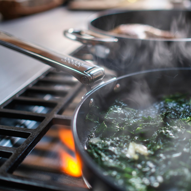 Joseph Joseph Space Ceramic Non-Stick Frying Pan with Folding Handle - 24cm on the stove