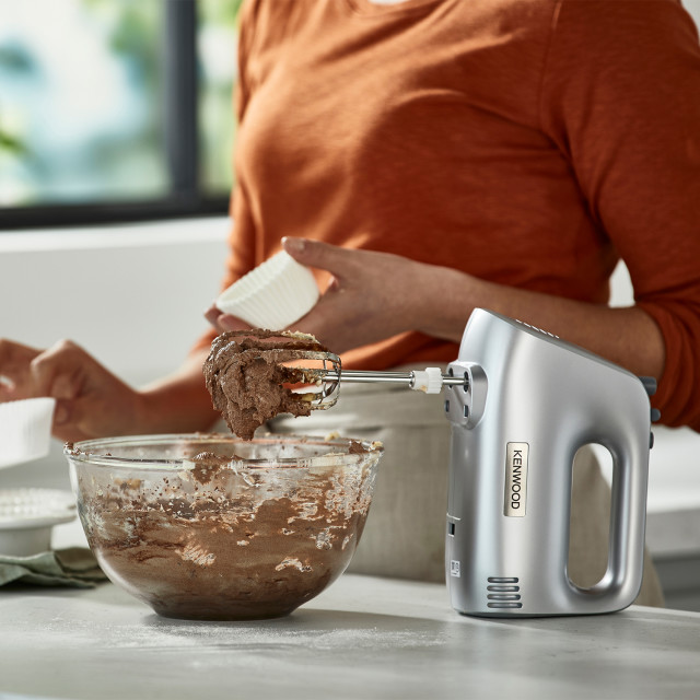 Kenwood HandMix Lite Hand Mixer, 450W on the table with chocolate cream