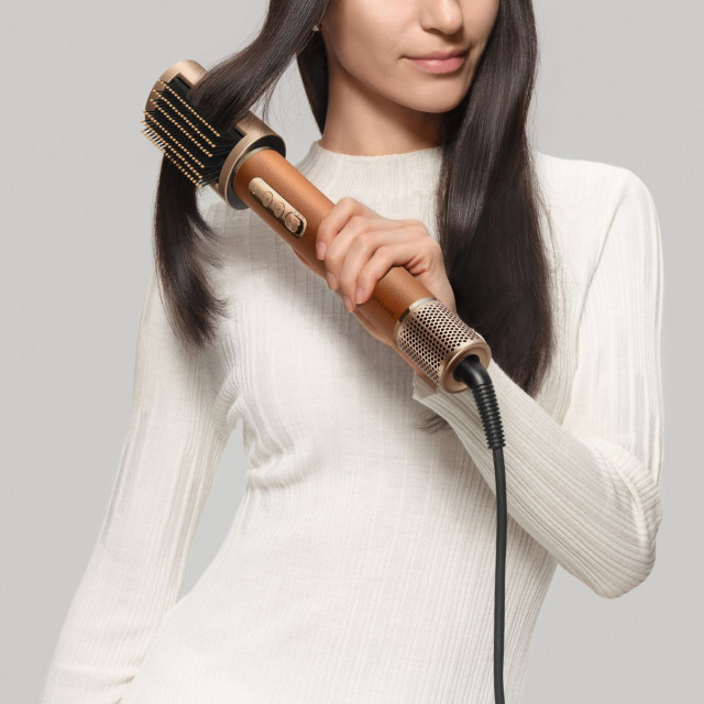 Dreame Airstyle Pro 7-in-1 Hair Drying & Styling Tool Kit combing hair