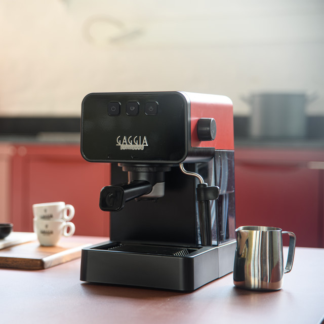 Gaggia Evolution Espresso Coffee Machine - Red on the kitchen counter
