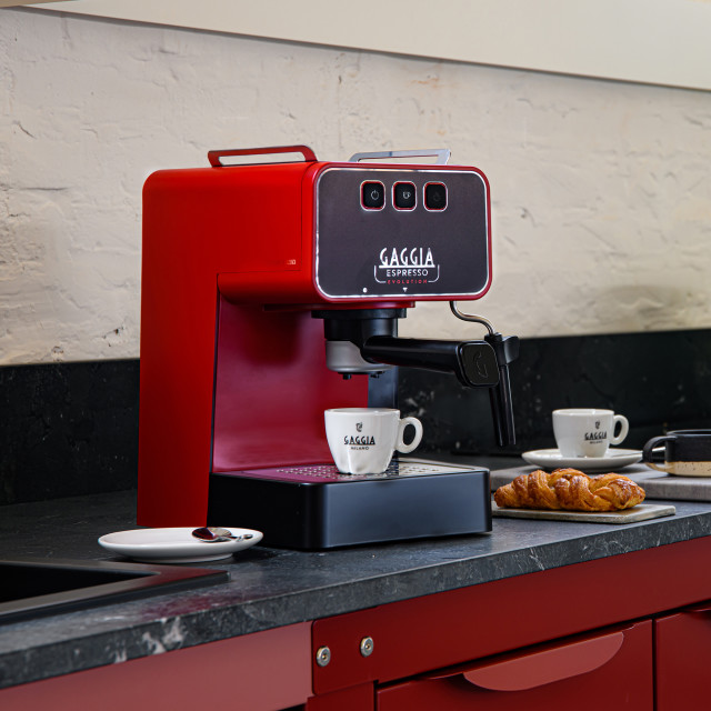 Gaggia Evolution Espresso Coffee Machine - Red on the kitchen counter